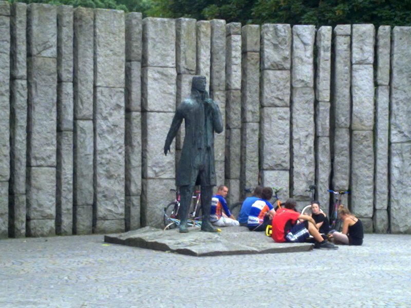 Cyclists resting at the feet of the father of Irish republicanism. I wonder what they are scheming?